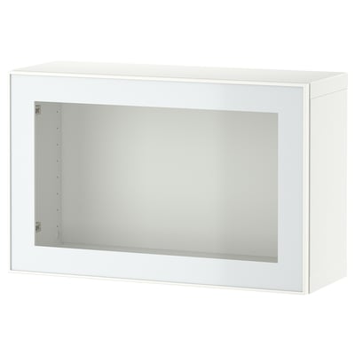 Une armoire BESTÅ blanche avec une porte vitrée. Il est rectangulaire, moderne et a un design minimaliste.
