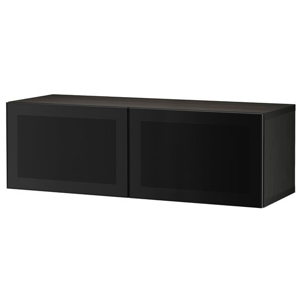 Unité de rangement BESTÅ noire, rectangulaire, portes en acier avec panneaux en maille, design minimaliste moderne.