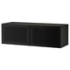 Unité de rangement BESTÅ noire, rectangulaire, portes en acier avec panneaux en maille, design minimaliste moderne.