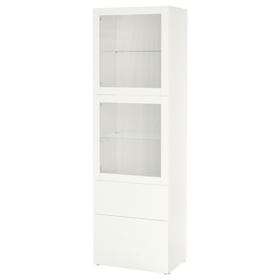 Armoire blanche Ikea BESTÅ - design élégant, haut et moderne avec portes en verre et tiroirs pour le rangement.