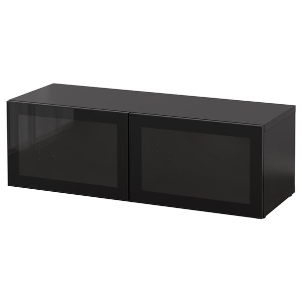 Unité de rangement BESTÅ noire : forme carrée moderne, finition brillante, portes coulissantes en verre, cadre en métal et verre.