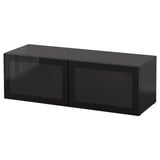 Unité de rangement BESTÅ noire : forme carrée moderne, finition brillante, portes coulissantes en verre, cadre en métal et verre.
