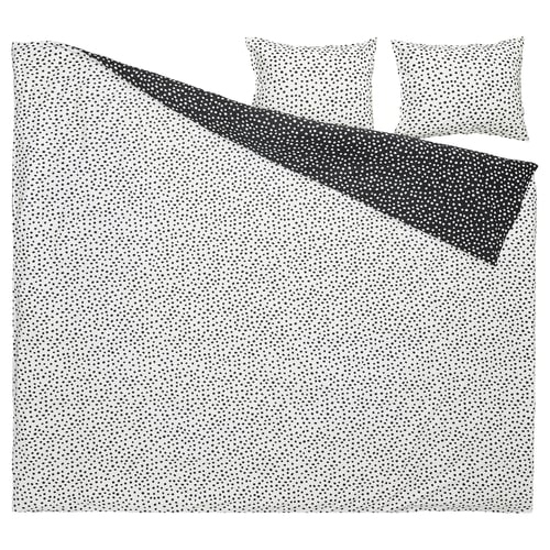 Parure de couette BJÖRKGRÅMAL, blanche à pois noirs, 4 pièces, forme rectangulaire avec fermeture enveloppe.