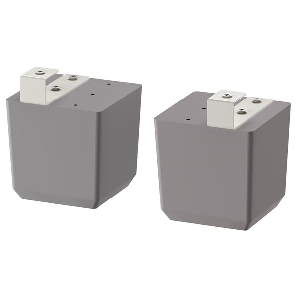 Deux pieds de meubles carrés gris avec pieds réglables, design épuré.