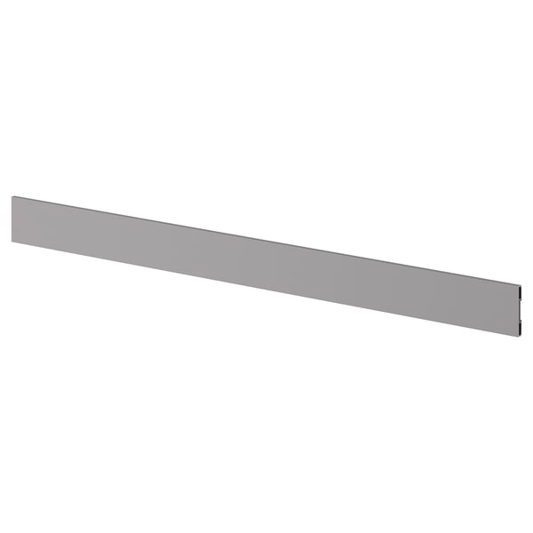 Un socle de cuisine BODBYN gris, lisse, rectangulaire, en plastique et élastomère, couvre les interstices.