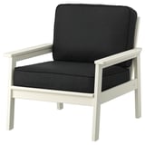 Fauteuil d’extérieur noir et blanc avec coussins sombres, au design moderne et fabriqué en bois d’acacia et en plastique.