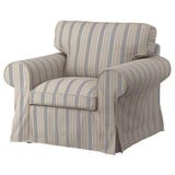 Fauteuil rayé beige brunâtre et blanc, accoudoirs roulés, coussins confortables, housse en coton et polyester.