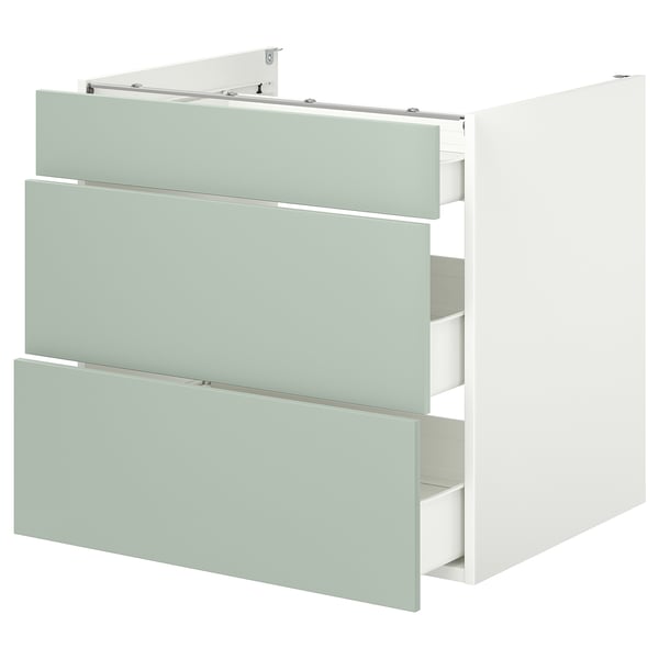 Armoire de cuisine ENHET avec tiroirs vert clair et trois tiroirs.