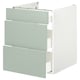 Option : Armoire à trois tiroirs ENHET en vert-gris pâle avec côtés blancs, design minimaliste moderne pour le rangement de la cuisine.