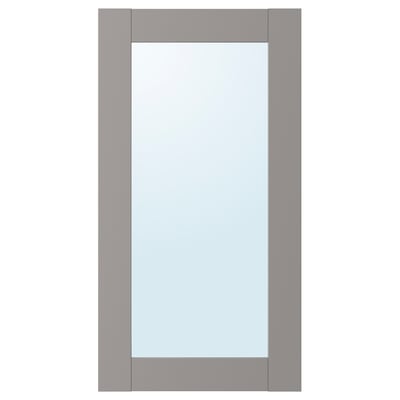 Un miroir ENHET à cadre gris avec un centre en verre transparent, une forme rectangulaire et un design simple.
