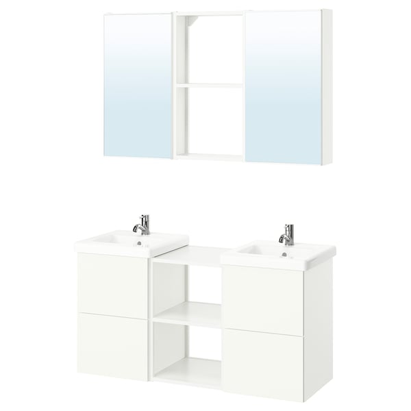 Vanité de salle de bain blanche symétrique avec double vasque, miroirs et rangement.