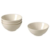 Quatre bols en céramique beige, trois empilés, un séparé, au design simple.