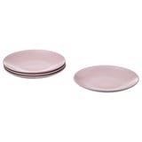 L’image montre quatre plaques roses, trois empilées et une plate, de conception simple, une surface lisse.