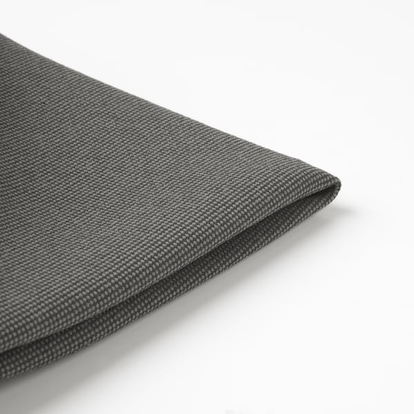 Gros plan d’un tissu gris texturé durable avec un motif à tissage fin ; Housse de coussin de qualité.