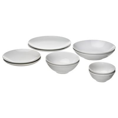 Service de vaisselle blanc : 6 assiettes, bols. Grès, finition lisse. Élégant, polyvalent.