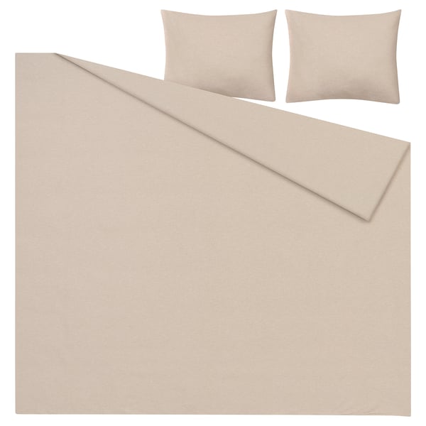 Parure de lit en flanelle beige GROVSNÄRJA avec couette et taies d’oreiller.