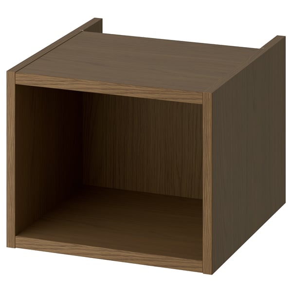 Une armoire ouverte HAGAÅN en finition bois. Il s’agit d’une unité de rangement de forme carrée au design simple et moderne, parfaite pour les essentiels de la salle de bain.