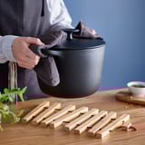 Cuisson en tablier par cuisinière.