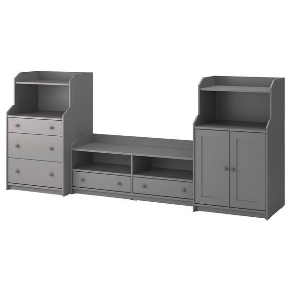 Un ensemble de meubles de rangement HAUGA gris avec portes et tiroirs, combinant des rangements ouverts et fermés avec un style classique.