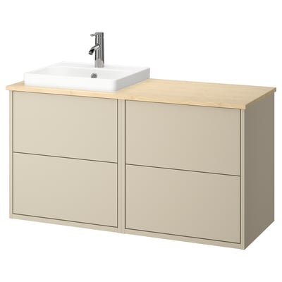 Un meuble-lavabo de salle de bain beige HAVBÄCK avec plan de travail en bois et vasque carrée en céramique. Unité murale montée avec deux tiroirs.