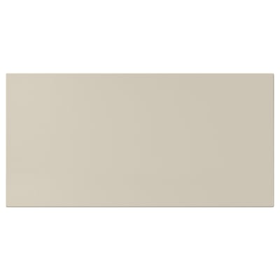 Un meuble de cuisine rectangulaire beige HAVSTORP avec des surfaces lisses en panneaux de fibres laqués, offrant un design moderne et neutre.