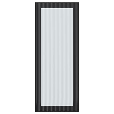 Porte en verre à cadre noir HEJSTA avec design cannelé, poignée élégante, se monte à gauche ou à droite.