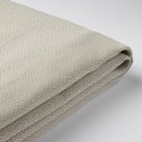 Tissu gris plié en gros plan, mettant en valeur la texture et la qualité de la housse HEMFJÄLLET.