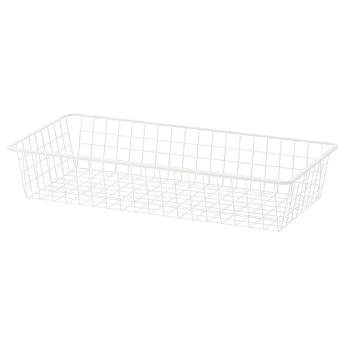 Un panier de rangement en treillis métallique blanc, rectangulaire et ouvert, idéal pour organiser les articles et permettre la circulation de l’air.