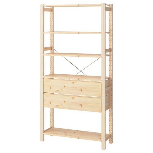 Une étagère en bois IVAR de couleur pin naturel, dotée de plusieurs étagères et tiroirs réglables, au design simple et robuste.