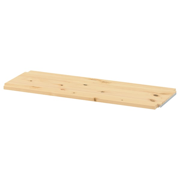 Une étagère en bois IVAR, naturelle, rectangulaire, en pin massif.