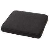 Un coussin de chaise JÄRPÖN/DUVHOLMEN noir de forme rectangulaire et au design rembourré. Il est fabriqué en polyester et a un fond antidérapant.