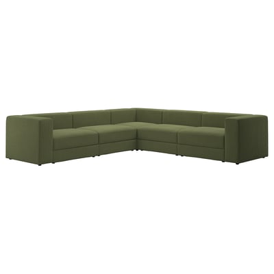 Un canapé sectionnel JÄTTEBO vert en forme de L avec un revêtement en velours côtelé texturé et des lignes épurées et modernes.
