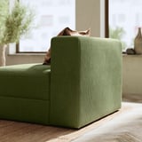 Canapé modulaire d’angle vert JÄTTEBO, présentant un design moderne avec un tissu en velours côtelé. Doux, incliné, avec rangement intégré.