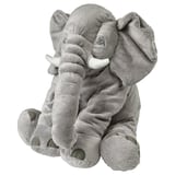 Peluche éléphant, gris, doux, grand, assis, visage amical, oreilles tombantes, défenses blanches.