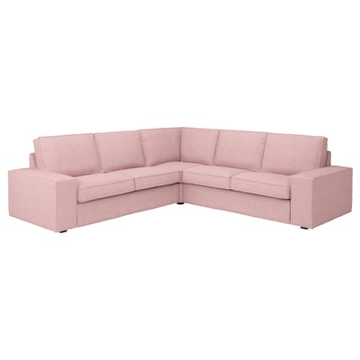 Un canapé sectionnel KIVIK rose clair avec des accoudoirs doux et bas et des coussins d’assise profonds, en tissu polyester pour plus de confort et de nettoyage facile.