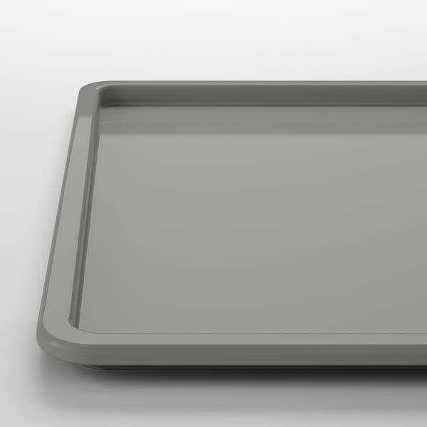Récipient en plastique gris vide, rectangulaire avec des bords lisses, propre et prêt à l’emploi.