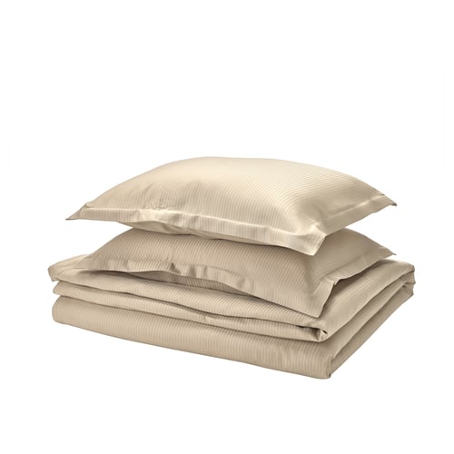 Parure de lit beige pliée. Comprend une housse de couette et des oreillers avec bordure à bride. Tissu lyocell doux et soyeux.