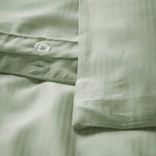Linge de lit LÄKEVÄNDEROT vert, lyocell, évacuation de l’humidité, fermeture à boutons.