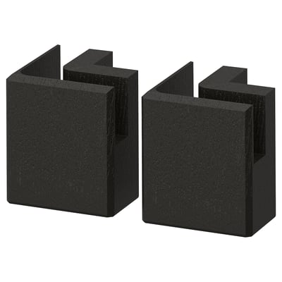 Deux pieds d’armoires de cuisine en bois noir, en frêne massif, rectangulaires, avec bords biseautés.