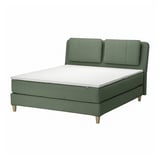 Lit LILLFJÄLLET vert avec tête de lit inclinée, coussins amovibles et matelas blanc sur pieds en bois.
