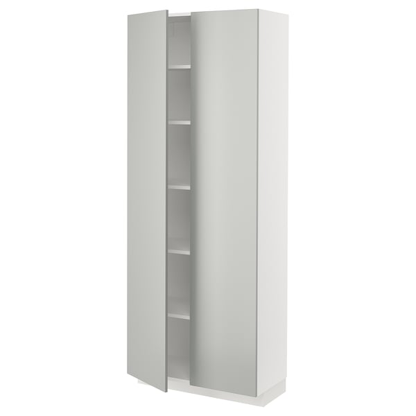 Une armoire de cuisine ikea METOD moderne et blanche avec des portes gris clair, un design élégant et des lignes épurées.