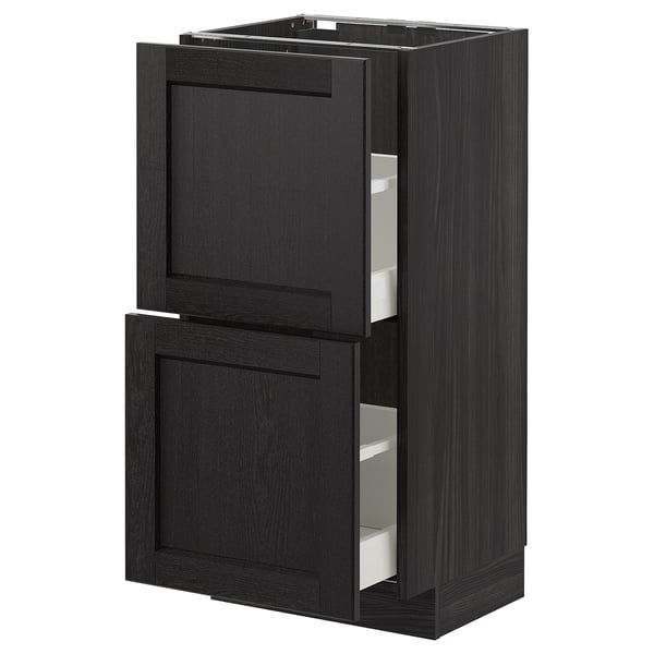 Meuble de cuisine Ikea METOD en bois teinté noir avec quatre tiroirs, design traditionnel.