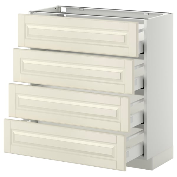 Une armoire de cuisine METOD blanche avec quatre tiroirs bodbyn, avec des bords biseautés blanc cassé et des mécanismes de fermeture automatique.