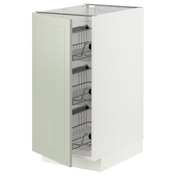 Une armoire de cuisine METOD en vert avec des étagères intérieures organisées.
