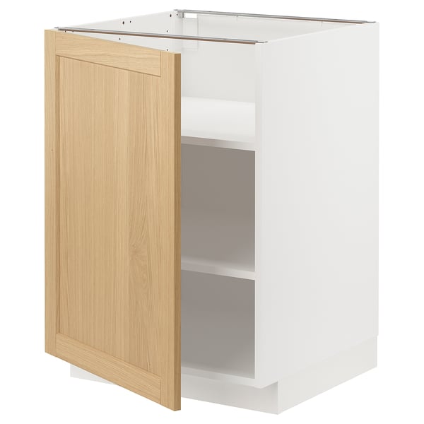 Armoire de cuisine METOD, blanche avec porte en chêne, forme carrée et bords biseautés.