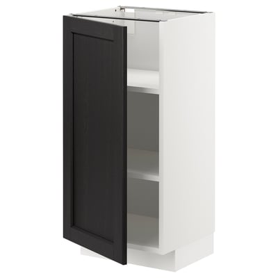 Armoire de cuisine METOD, blanc et noir, porte entrouverte, étagères réglables.