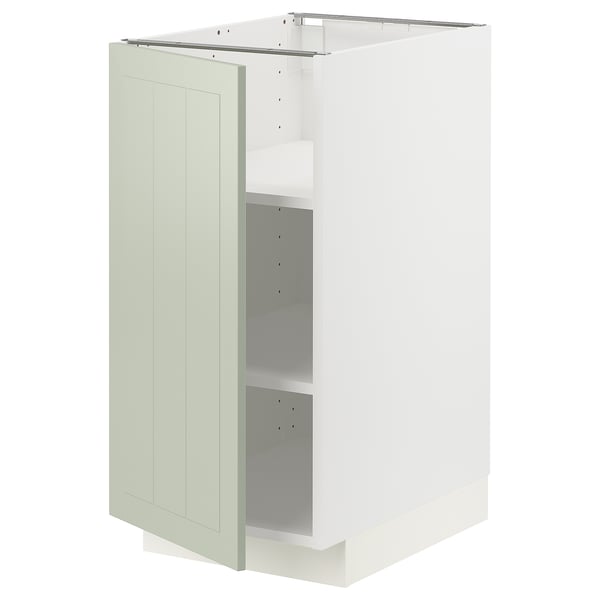 Un meuble de cuisine METOD blanc avec une porte en stensund vert, rectangulaire avec une surface plane et un design à panneaux.