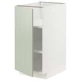 Un meuble de cuisine METOD blanc avec une porte en stensund vert, rectangulaire avec une surface plane et un design à panneaux.