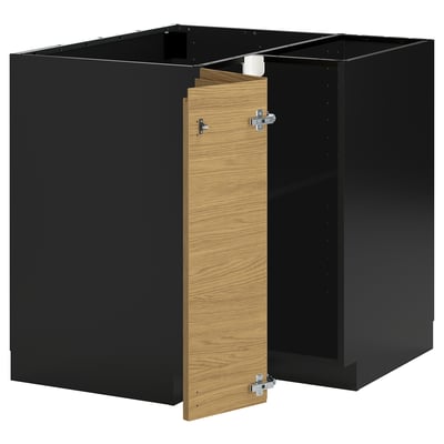 Une armoire de cuisine modulaire METOD noire avec une porte texturée en bois.