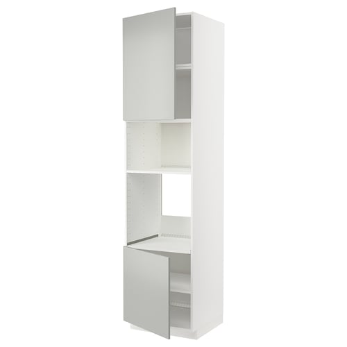 Un meuble de cuisine ikea METOD blanc avec deux portes ouvertes, offrant une solution de rangement moderne et minimaliste.